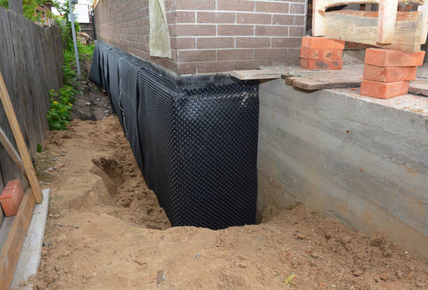Happy homeowners after waterproofing job in Hackensack